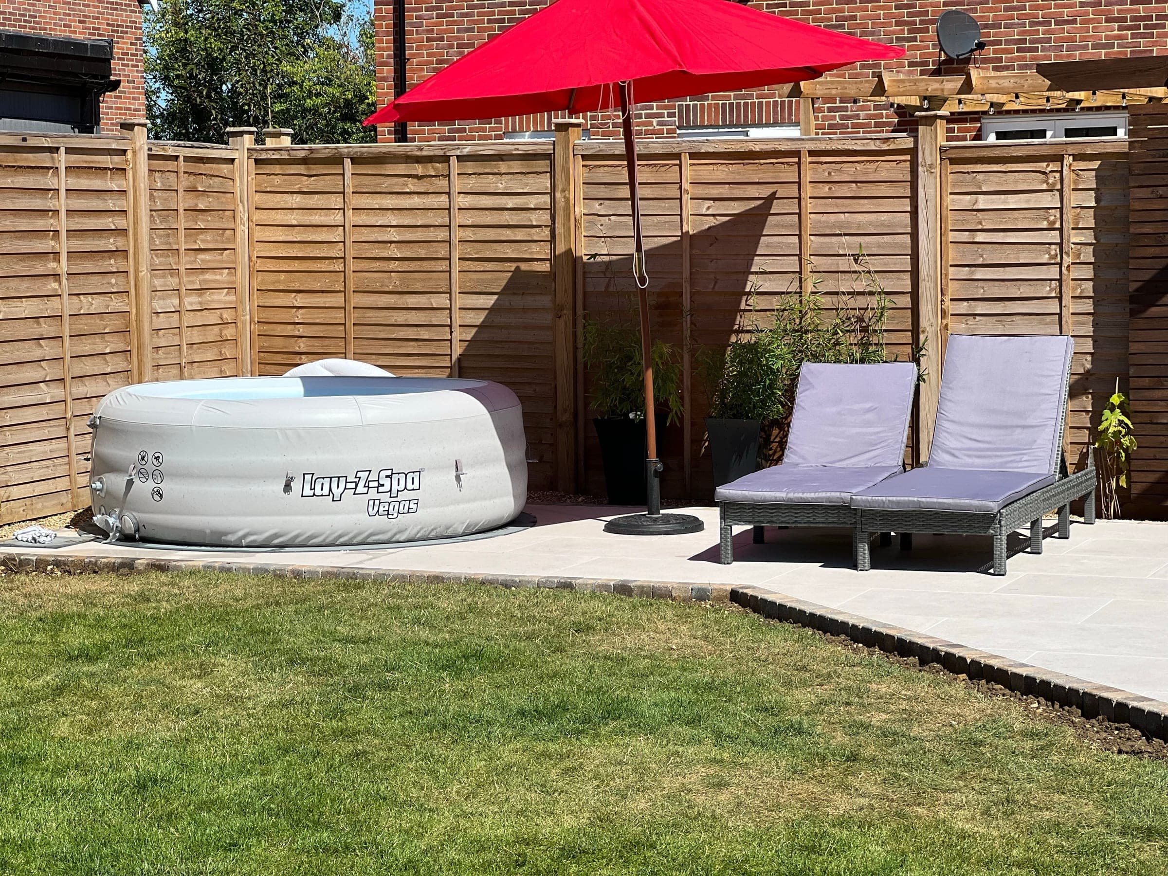 Contemporary porcelain patio garden, Gillingham