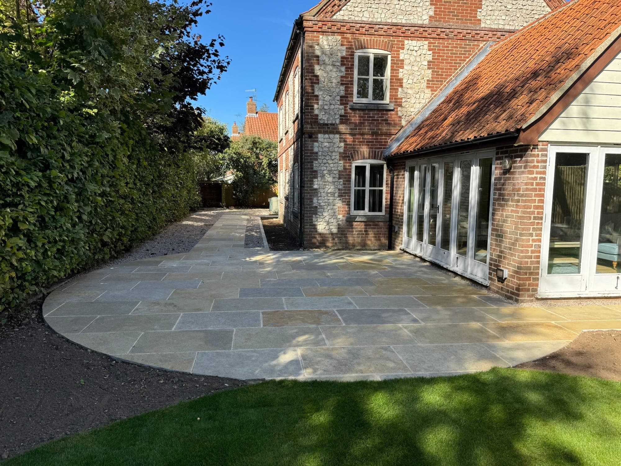 Scoring pebbles and gravel paths Norfolk