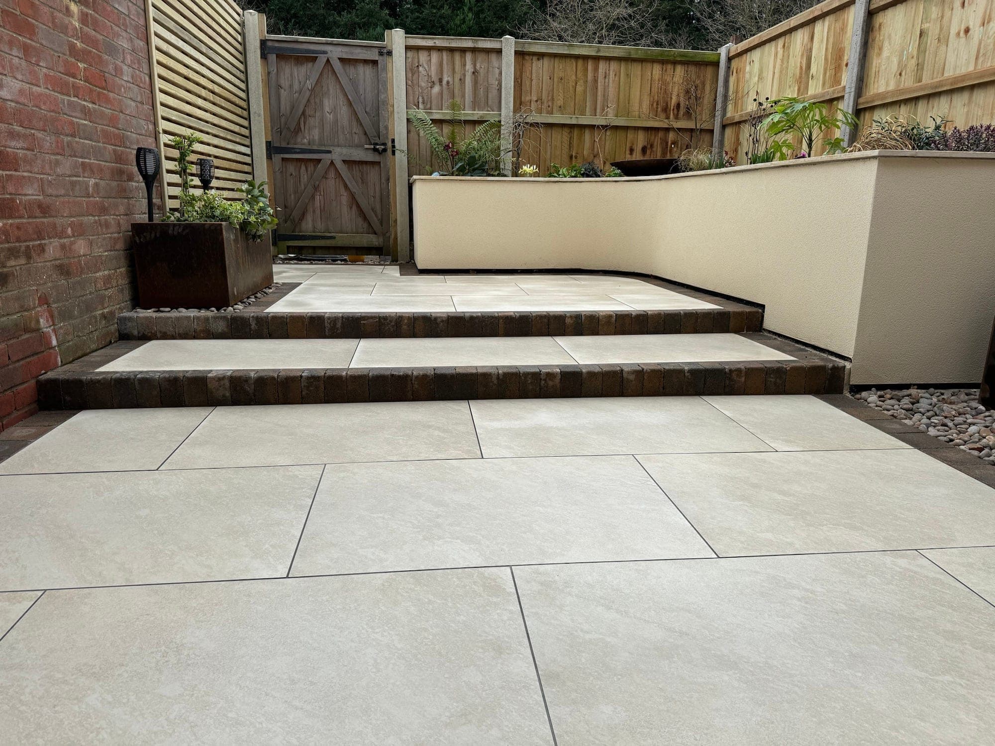 Corner planter and porcelain patio Marsham