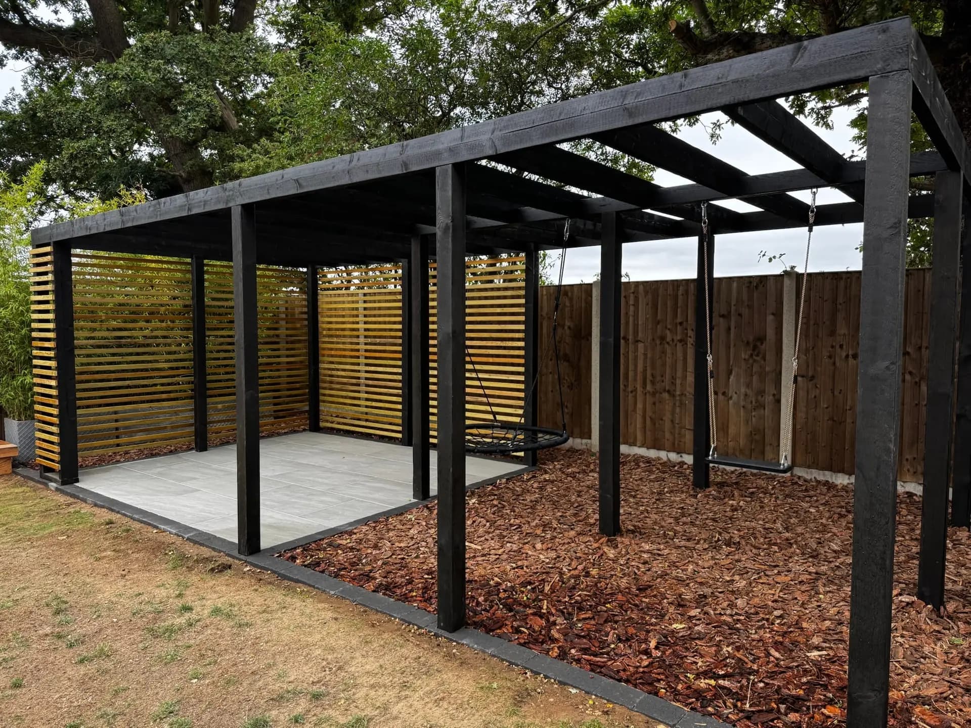 Slatted pergola with Osmo oil finish