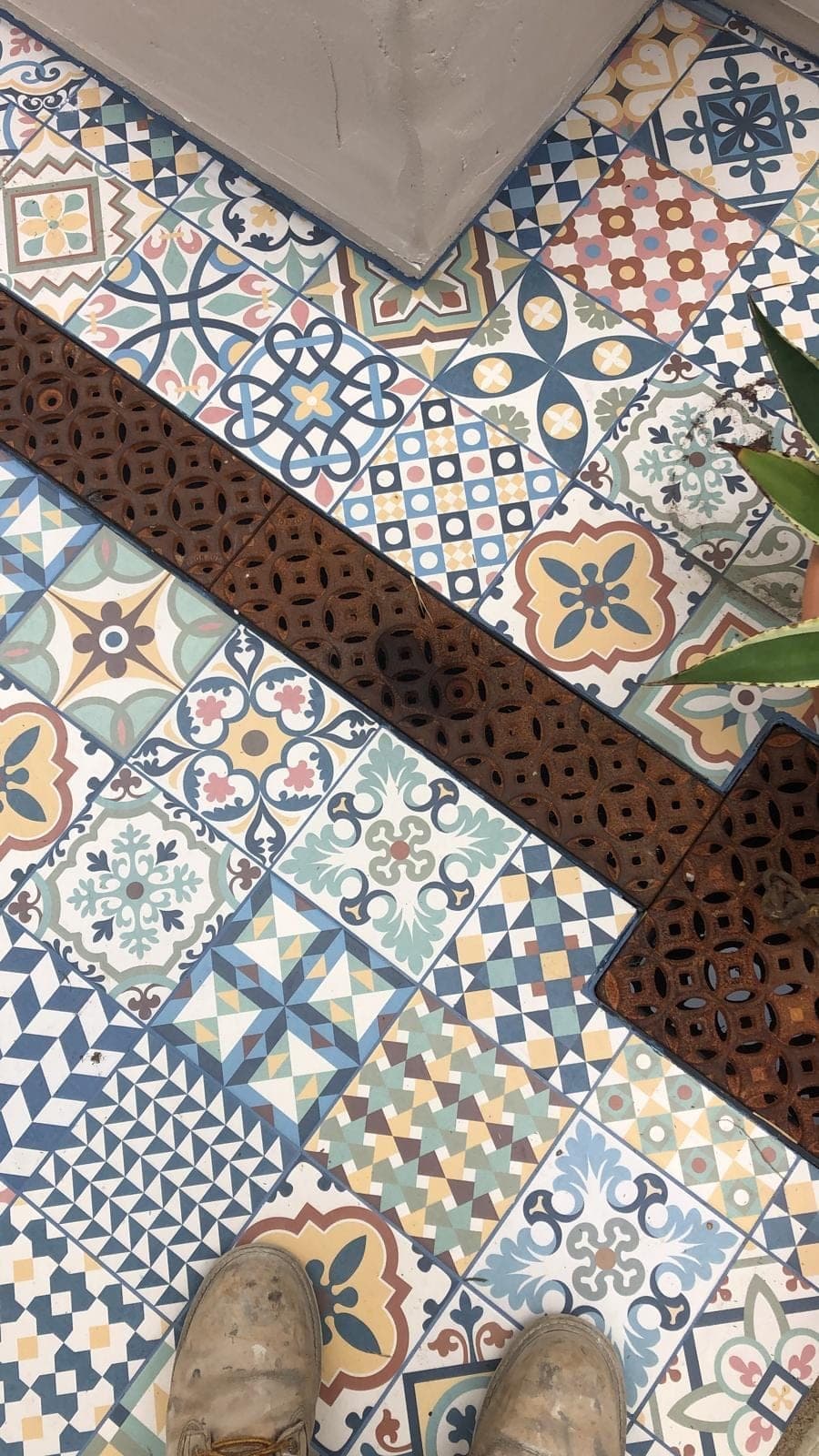 Rustic render pergola and tropical planting